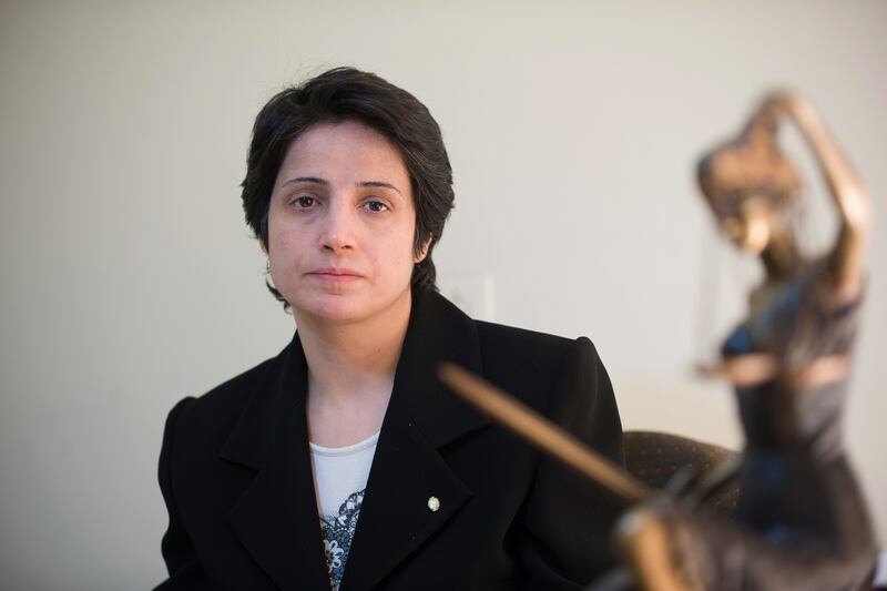 articles/2012/12/06/iran-nasrin-sotoudeh-s-victorious-hunger-strike/memarian-sotoudeh-hugner-strike-tease_w5cj3a