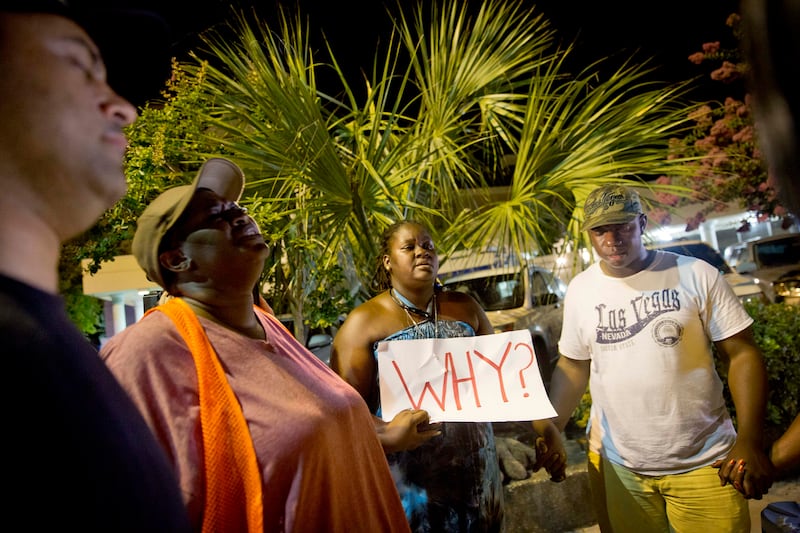 articles/2015/06/18/behind-the-hate-crime-massacre-in-a-charleston-church/150618-charleston-shooting-05_gkzmlq