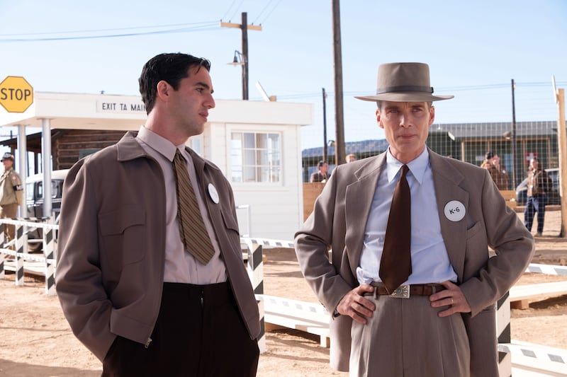 Benny Safdie talks to Cillian Murphy in a still from 'Oppenheimer'