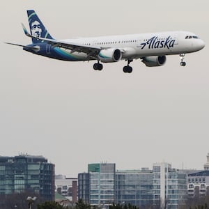 An Alaska Airlines plane prepares to land.