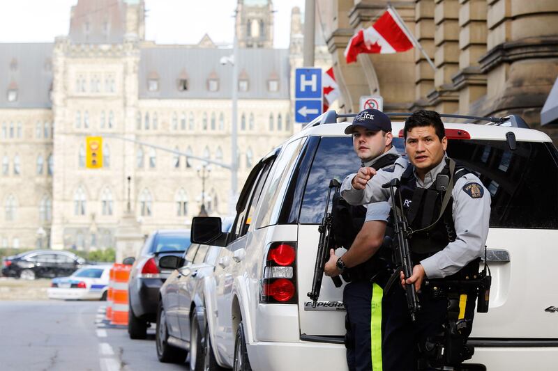 articles/2014/10/22/terrorists-end-canada-s-innocence/141022-ottawa-shooting-1_rv8f3z