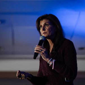 Nikki Haley holding a microphone 