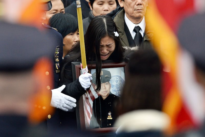 galleries/2015/01/04/nypd-remembers-slain-officer-wenjian-liu-photos/150104-lui-funeral4_m82lcp