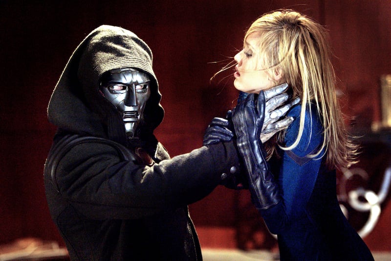 Dr. Doom holds Sue Storm by the neck in a still from ‘Fantastic Four’