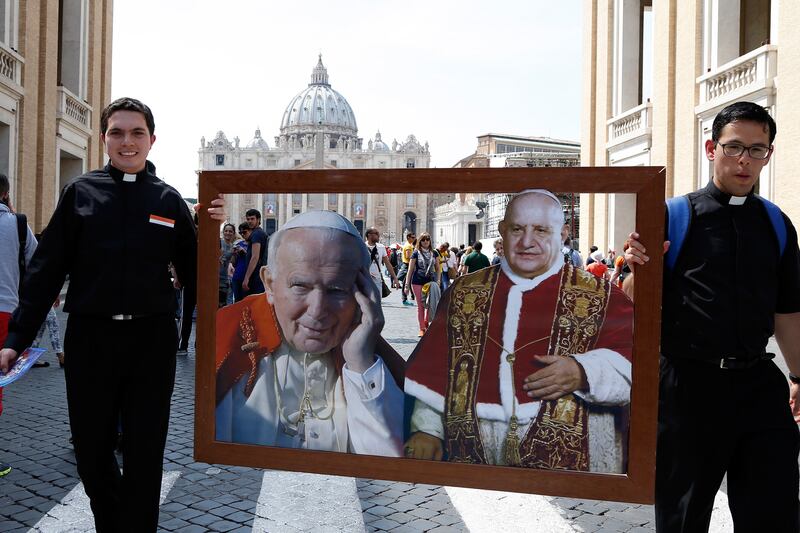 articles/2014/04/26/popes-saints-miracles-weird-relics-and-odd-omens-converge-on-rome/140425-nadeau-saints-tease_lvi9ce