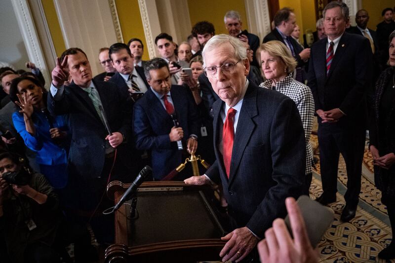 A photo of Mitch McConnell taking questions at a news conference