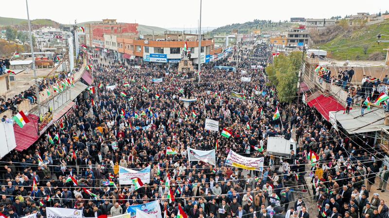 Hundreds of protesters gather to protest against the attack by Iran's Islamic Revolutionary Guard Corps in Iraq.