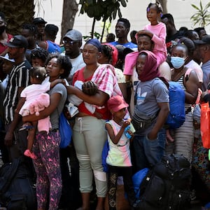 Migrants, mostly Haitians, wait to be sent to different migration centers in Puebla, Hidalgo, and Queretaro to obtain their humanitarian visas.