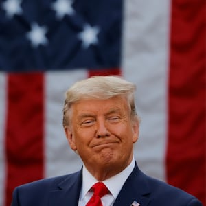 U.S. President Donald Trump smiles as he delivers an update on the so-called Operation Warp Speed program in an address from the Rose Garden at the White House in Washington, D.C., Nov. 13, 2020. 