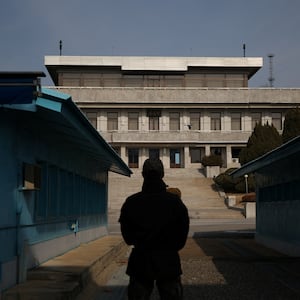 A South Korean soldier stands guard in the truce village of Panmunjom inside the demilitarized zone (DMZ) separating North Korea and South Korea. 