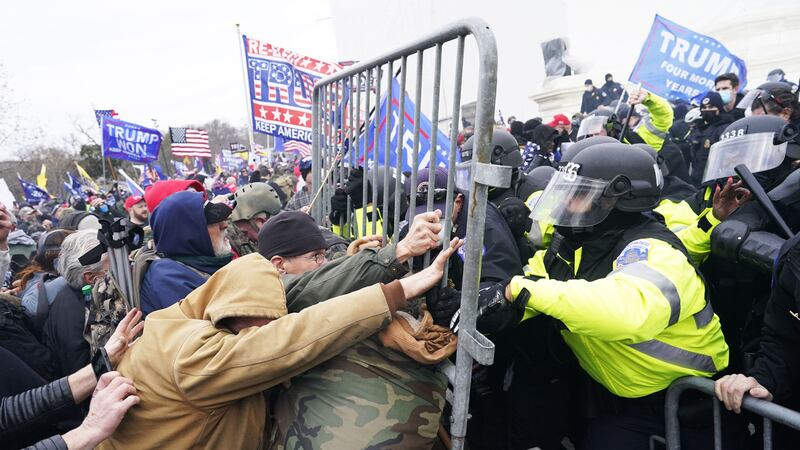 A photo including Protesters on the Second Day of Pro-Trump Events.