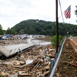 Debris piled on the bridge from Lake Lure to Chimney Rock in North Carolina after Hurricane Helene.