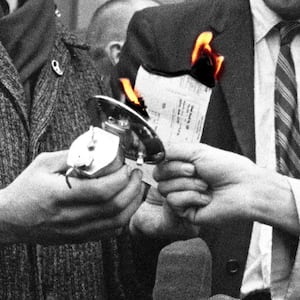 A photo illustration showing the burning of pacifists draft cards in the USA during a protest of the Vietnam War.