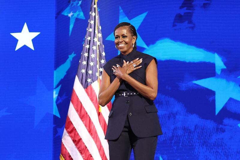 Michelle Obama takes the Democratic National Convention stage at the United Center in Chicago.