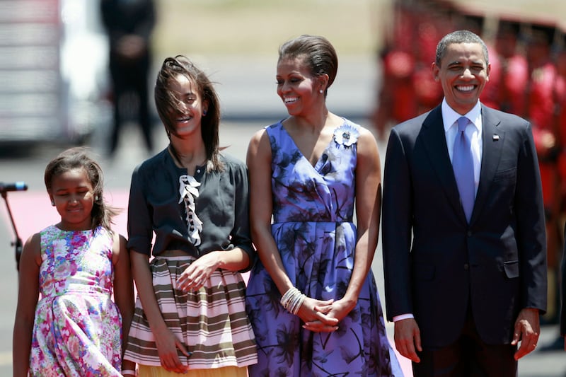 galleries/2010/05/07/first-lady-fashion/flower-purple-dress-first-lady-fashion-gallery_fjmykm