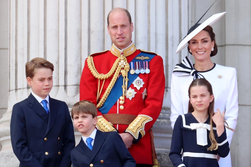 (L-R) Prince George of Wales, Prince William, Prince of Wales, Prince Louis of Wales, Princess Charlotte of Wales and Catherine, Princess of Wales during the March of the Color at Buckingham Palace on June 15, 2024 in London, England.