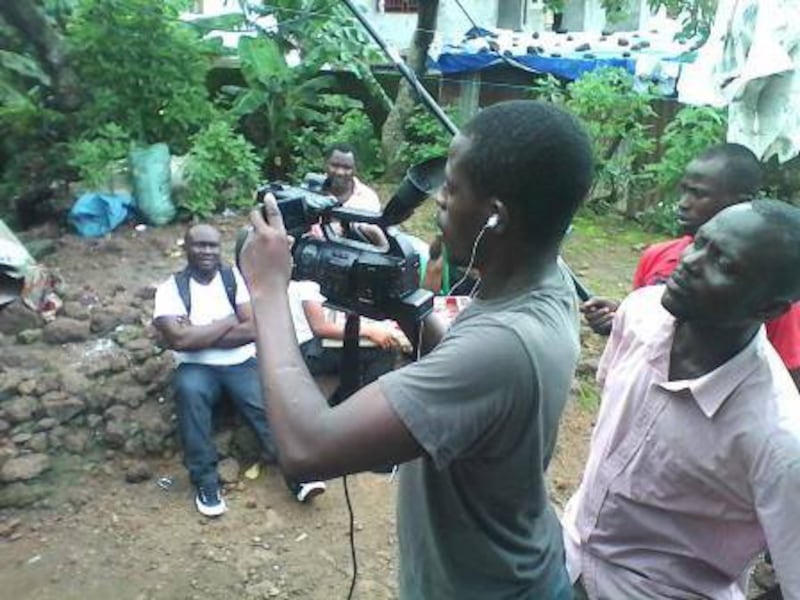 articles/2014/08/20/courageous-filmmakers-are-fighting-ebola-on-screen/140819-haglage-filmmakers-embed2_xgu2fo