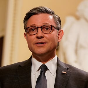 Johnson speaks to reporters in the Capitol.