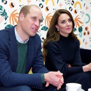 Prince William and Kate Middleton listen to young adults during a visit to the Open Door Charity in Birkenhead, Britain January 12, 2023.