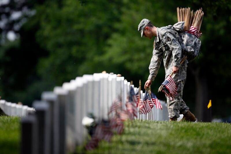 articles/2012/05/27/billy-lynn-s-long-halftime-walk-by-ben-fountain-the-war-novel-of-our-time/gallagher-memorial-day-embed_x1xpw2