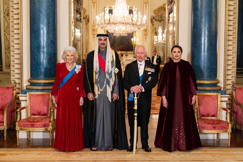 King Charles III (2nd R) and Queen Camilla (L) with the Emir of Qatar Sheikh Tamim bin Hamad Al Thani and his wife Sheikha Jawaher bint Hamad bin Suhaim al-Thani ahead of a state banquet at Buckingham Palace