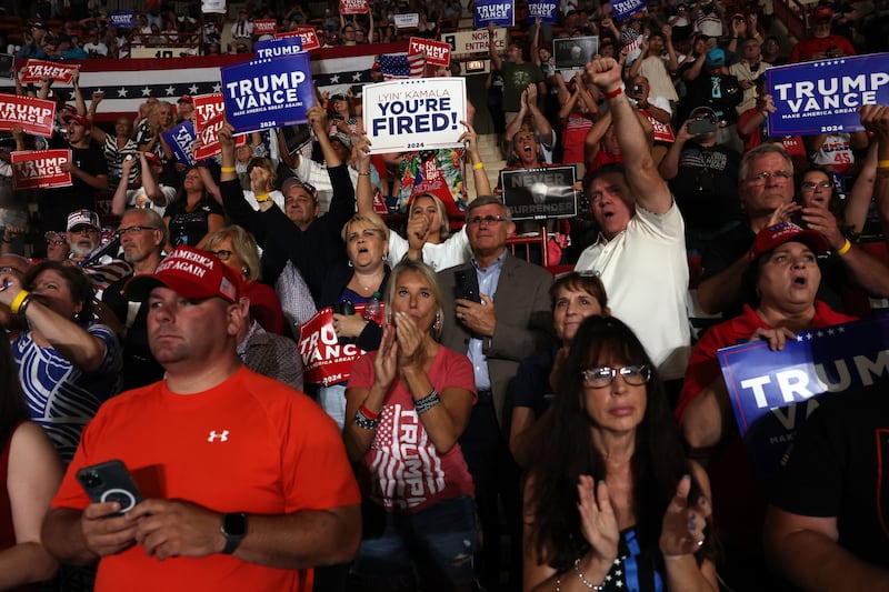 Supporters watch as former President Donald Trump speaks at a campaign appearance on July 31, 2024 in Harrisburg, Pennsylvania. Trump is returning to Pennsylvania for the first time since the assassination attempt on lis life.