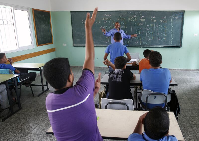 articles/2013/02/04/do-israeli-and-palestinian-schoolbooks-incite-hatred/palestinian-schoolchildren-openz_anrvto