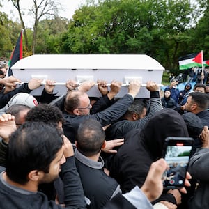 Mourners carry the coffin of six-year-old Wadea Al-Fayoume during his funeral at Parkholm Cemetery.