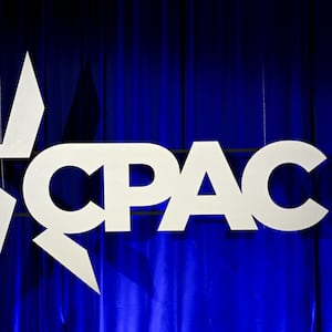 CPAC logo on a cloth background.