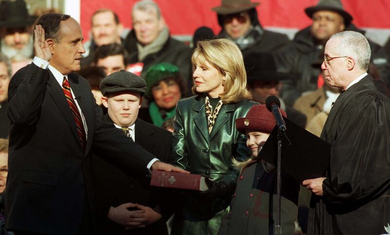 Rudy Giuliani, his then-wife Donna Hanover, and his daughter Caroline at his swearing in ceremony to become mayor of New York City.