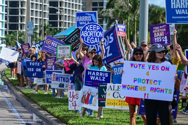 Demonstrators rally in support of reproductive rights and US Vice President and Democratic presidential candidate Kamala Harris during the National Women's March in West Palm Beach, Florida, on November 2, 2024.