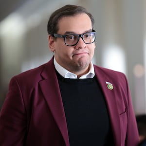 U.S. Rep. George Santos (R-NY) returns to a House Republican caucus meeting at the Longworth House Office Building on October 13, 2023 in Washington, D.C.