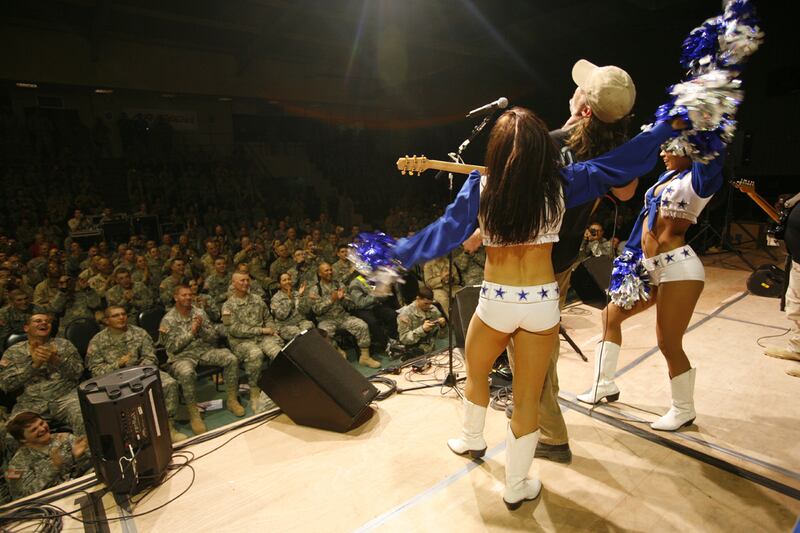 articles/2011/10/06/stephen-colbert-bob-hope-more-uso-stars-who-entertained-troops-over-70-years/us-greatest-hits-dallas-cowboys_wzhwt8