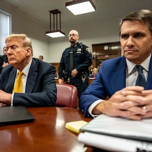 Former U.S. President Donald Trump appears in court with attorneys Emil Bove (L) and Todd Blanche (R)  for his trial for allegedly covering up hush money payments at Manhattan Criminal Court on May 21, 2024 in New York City. 