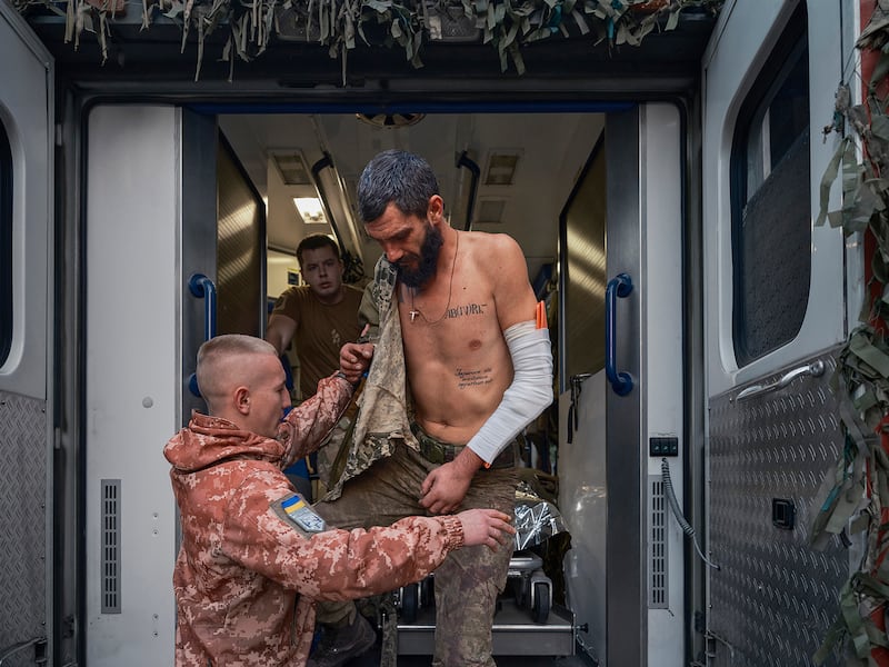 An injured Ukrainian soldier receives treatment. 