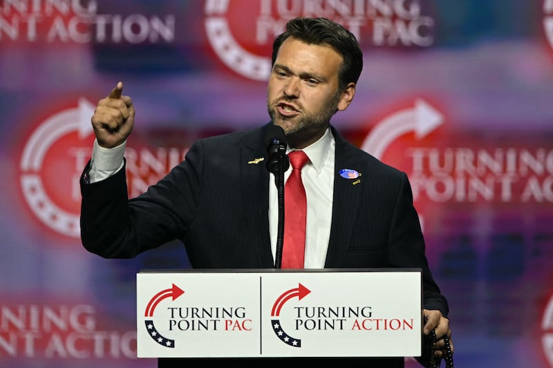 Far-right activist Jack Posobiec speaks during a Turning Point Action "United for Change" campaign rally for Donald Trump.