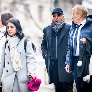 Indian-Swiss billionaire family members Namrata Hinduja (L) and Ajay Hinduja (2ndR) arrive at the Geneva's courthouse with their lawyers Yael Hayat (C) and Robert Assael (R) at the opening day of their trial for human trafficking on January 15, 2024.