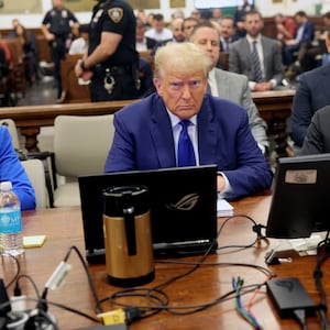 Former President Donald Trump sits in court with attorney Christopher Kise during his civil fraud trial at New York State Supreme Court