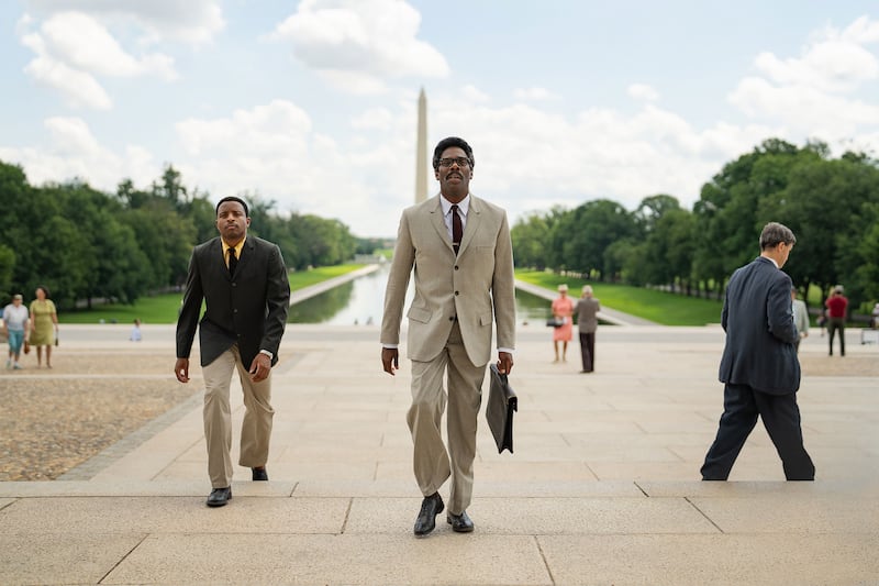 Coleman Domingo walking up stairs in a still from ‘Rustin’