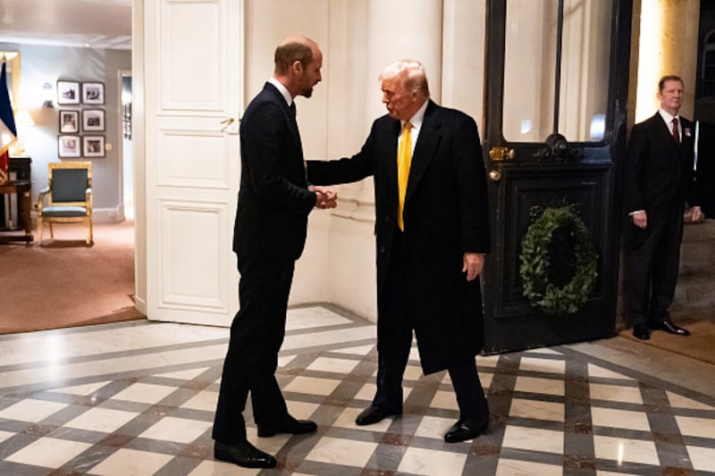 PARIS, FRANCE - DECEMBER 7: US President-elect Donald Trump meets with Britain's Prince William and the Prince of Wales at the Salon Jaune Room of the British Ambassador's Residence on the day of the reopening of Notre Dame Cathedral in Paris. Six months have passed since the devastating fire that occurred in Paris, France on December 7, 2024. (Photo by Aaron Chown - Pool/Getty Images)