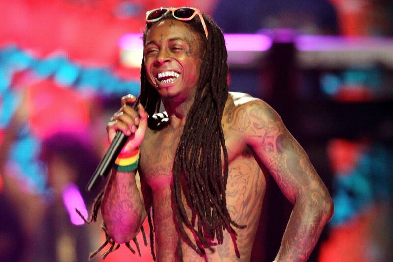 articles/2013/03/18/rapper-lil-wayne-and-his-struggle-with-sizzurp-drank/130317-lil-wayne-samuels-tease_e4zuuu