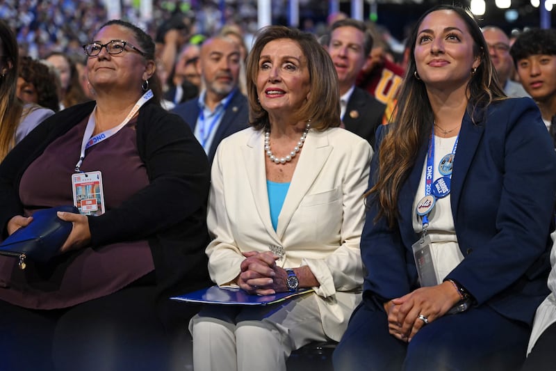 Nancy Pelosi in white at the DNC