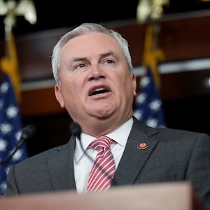 Image: James Comer speaking at the podium.