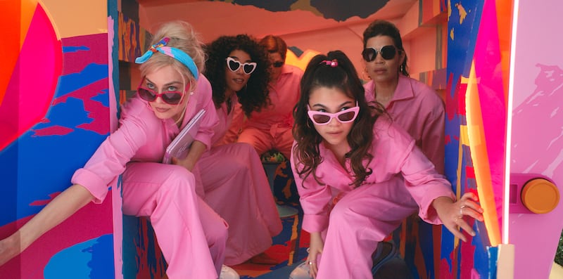 A photo still of Margot Robbie, Alexandra Shipp, Michael Cera, Ariana Greenblatt and America Ferrera in the movie Barbie.