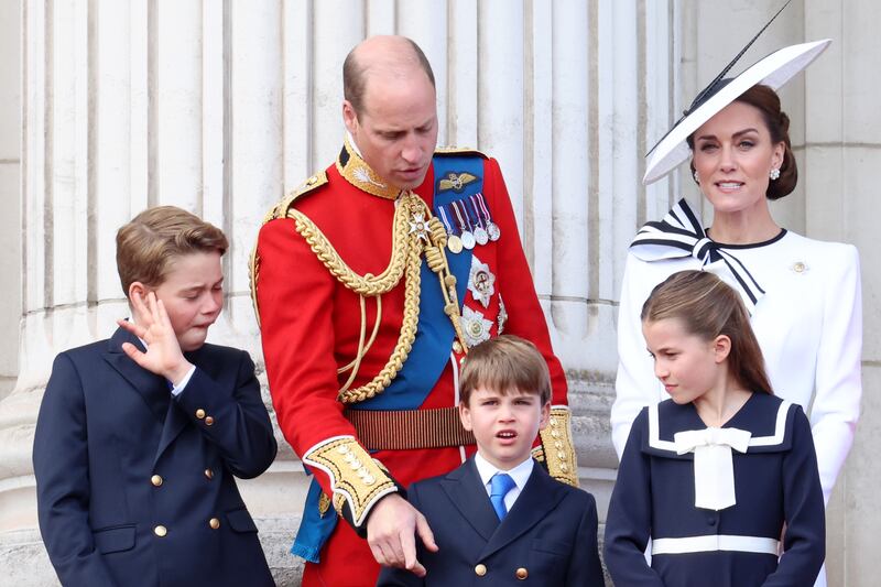 Prince George of Wales, Prince William, Prince of Wales, Prince Louis of Wales, Princess Charlotte of Wales and Catherine, Princess of Wales during Trooping the Colour at Buckingham Palace on June 15, 2024 in London, England.