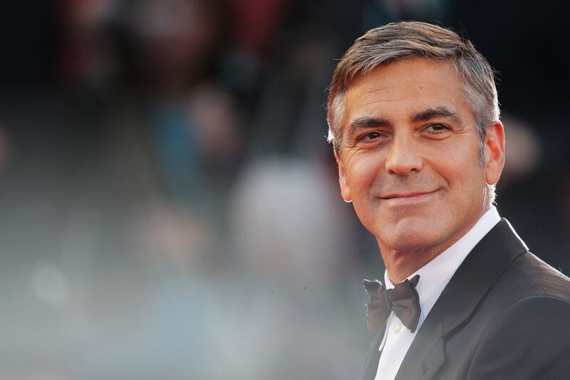 articles/2014/09/28/george-clooney-the-consummate-charmer/140209-teeman-clooney-tease_puutnu