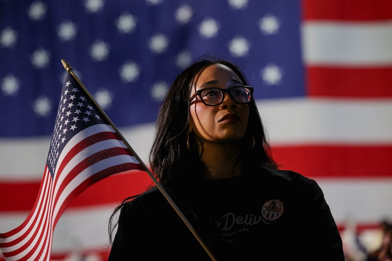 An attendee reacts to early election results at Democratic presidential nominee U.S. Vice President Kamala Harris' election night rally during the 2024 U.S. presidential election, at Howard University, in Washington, U.S., November 5, 2024 REUTERS/Kevin Mohatt