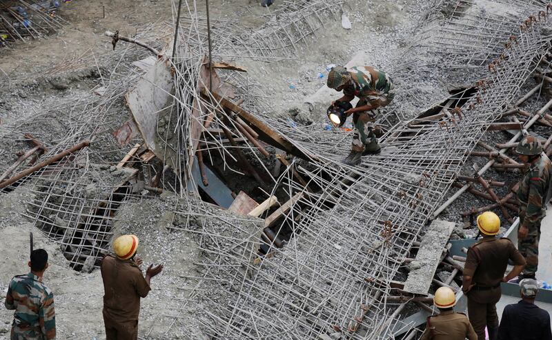 galleries/2016/03/31/indian-bridge-collapse-kills-14-people/160331-Kolkata-Overpass-Collapse-05_gxtawz