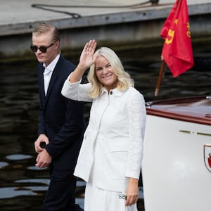 Crown Princess Mette-Marit of Norway and Marius Borg Hoiby walking in 2016.