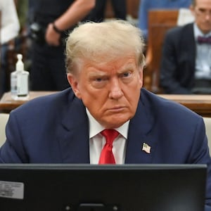 Former US President Donald Trump sits inside the courtroom for the third day of his civil fraud trial in New York